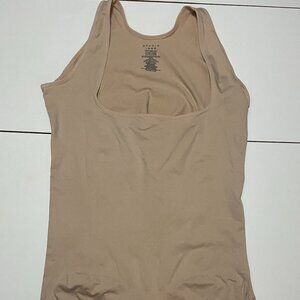 Lot of body shaper and mesh lingerie bag.